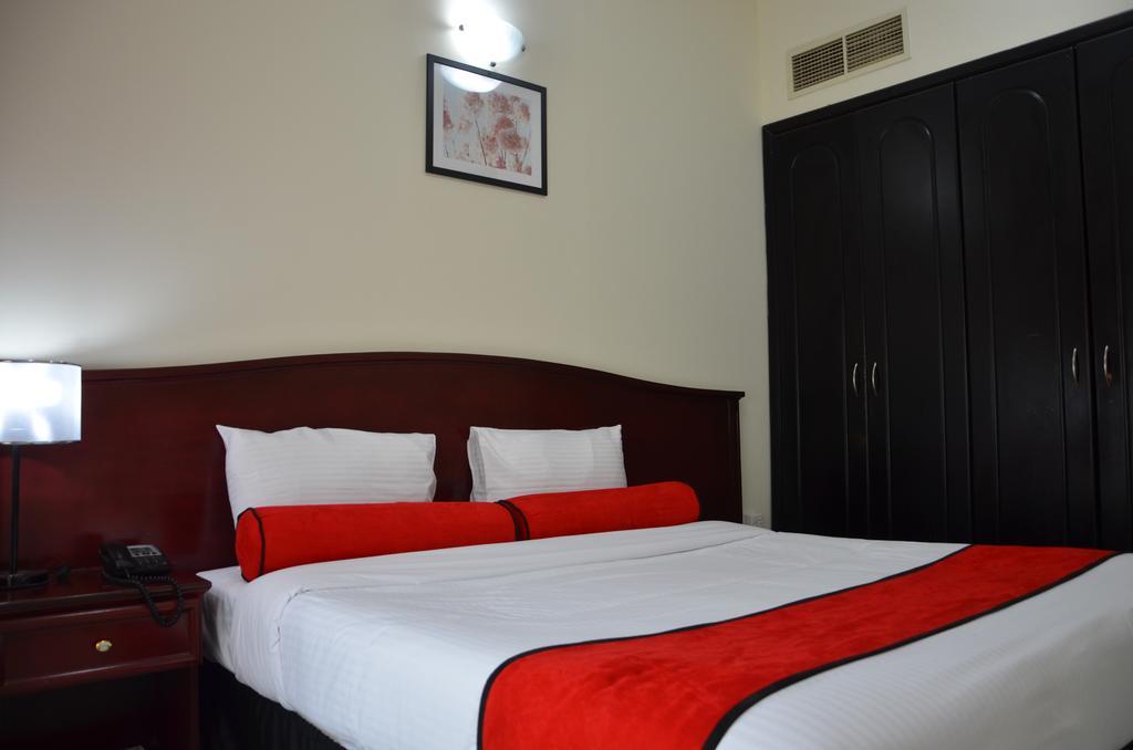 High End Hotel Apartments Dubai Quarto foto